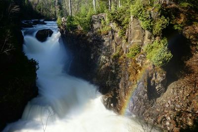 Stream flowing through rocks