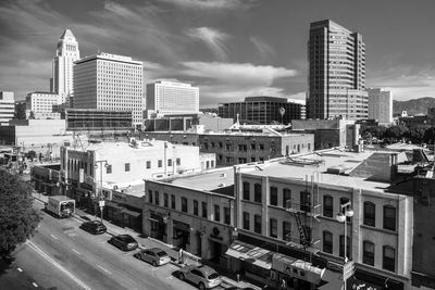 High angle view of buildings in city against sky