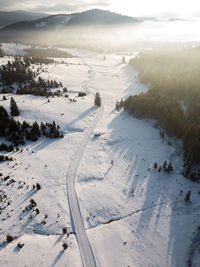 Scenic view of snow covered landscape