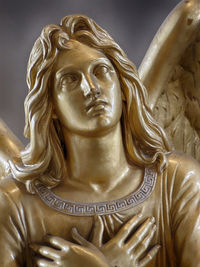 Close-up of golden angel statue