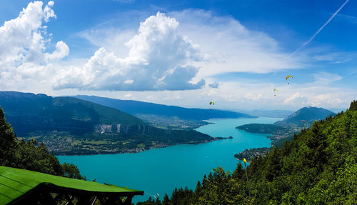 Panoramic view of trees and mountains against sky