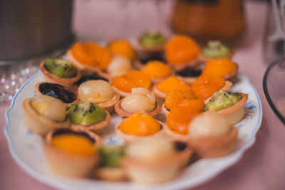 High angle view of fruits in plate on table