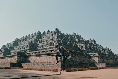 Exterior of temple against clear sky