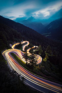 High angle view of illuminated road against sky