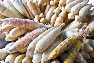High angle view of corns for sale at market stall