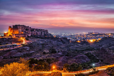 High angle view of townscape against sky during sunset