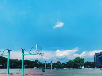 Scenic view of basketball against blue sky