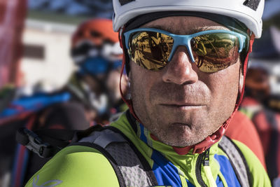 Close-up portrait of man wearing sunglasses