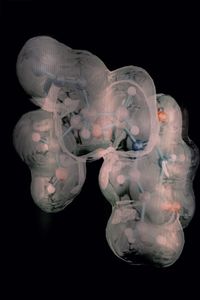 Close-up of illuminated lights against black background