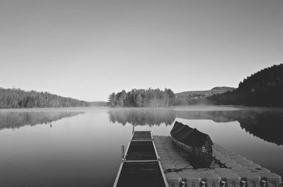 Reflection of trees in calm lake