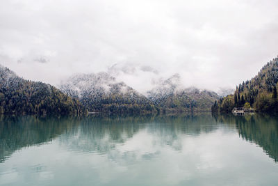 Panorama ritsa lake in the spring morning, with clouds and blue water