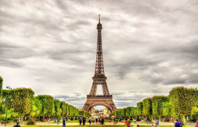 View of communications tower against cloudy sky