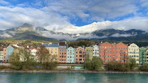 Tirol innsbruck old town buildings with river and mountains