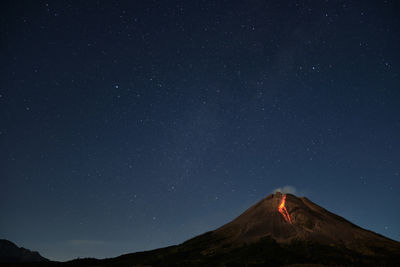 Scenic view of star field against sky at night