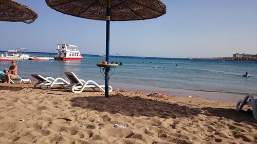 Scenic view of beach against clear sky