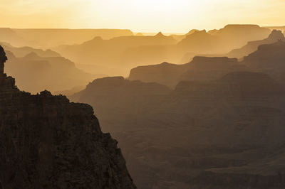 Scenic view of grand canyon during foggy weather