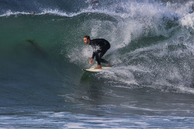 Man surfing in sea