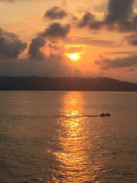 Scenic view of sunset over sea