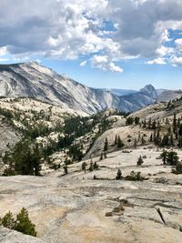 Scenic view of landscape and mountains against sky