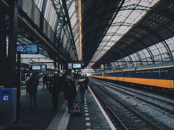 People at railroad station