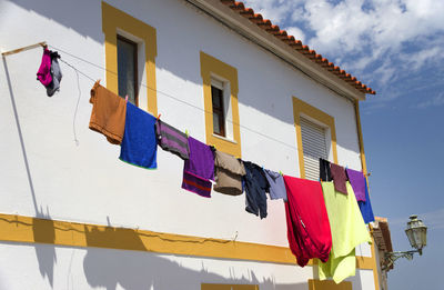 Clothes drying against the wall