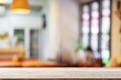 Close-up of wine glass on table at cafe