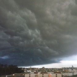 Storm clouds over city