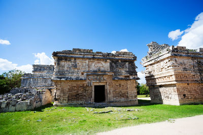 Old ruin building against blue sky