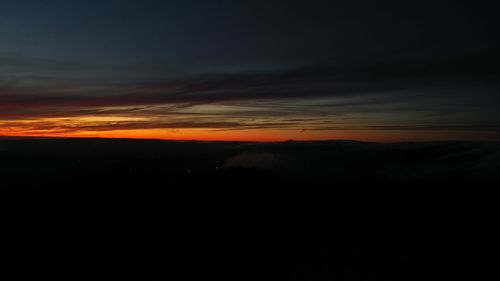 Low angle view of dramatic sky during sunset