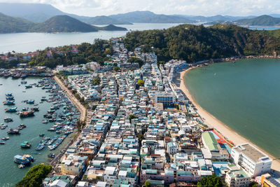 High angle view of bay and buildings in city