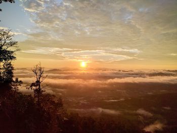 Scenic view of landscape against sky during sunset