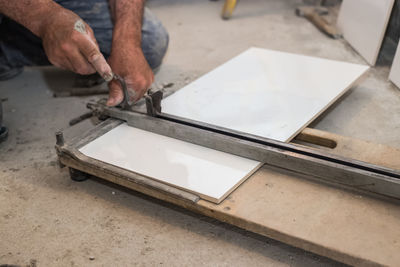 High angle view of man working on table