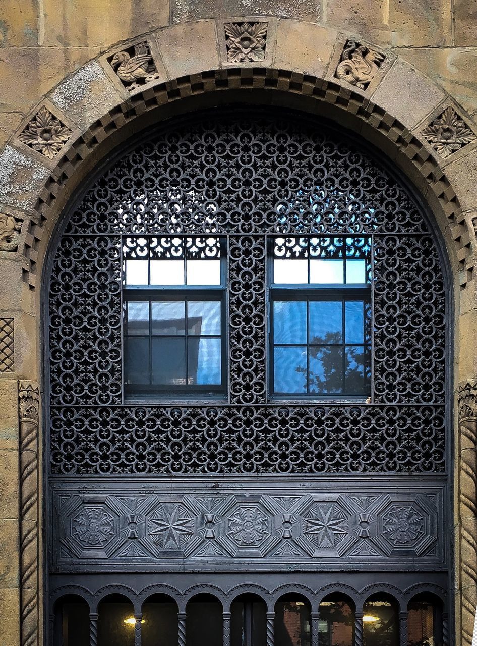 LOW ANGLE VIEW OF WINDOW ON BUILDING