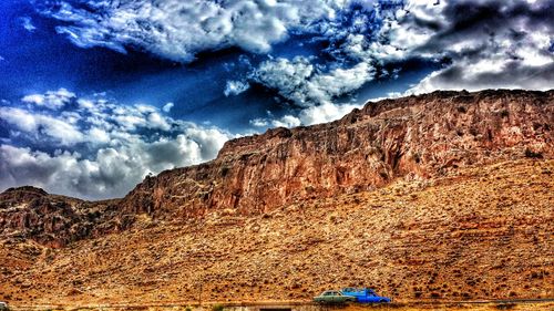 Scenic view of rocky mountains against sky