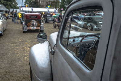 Close-up of vintage cars on street