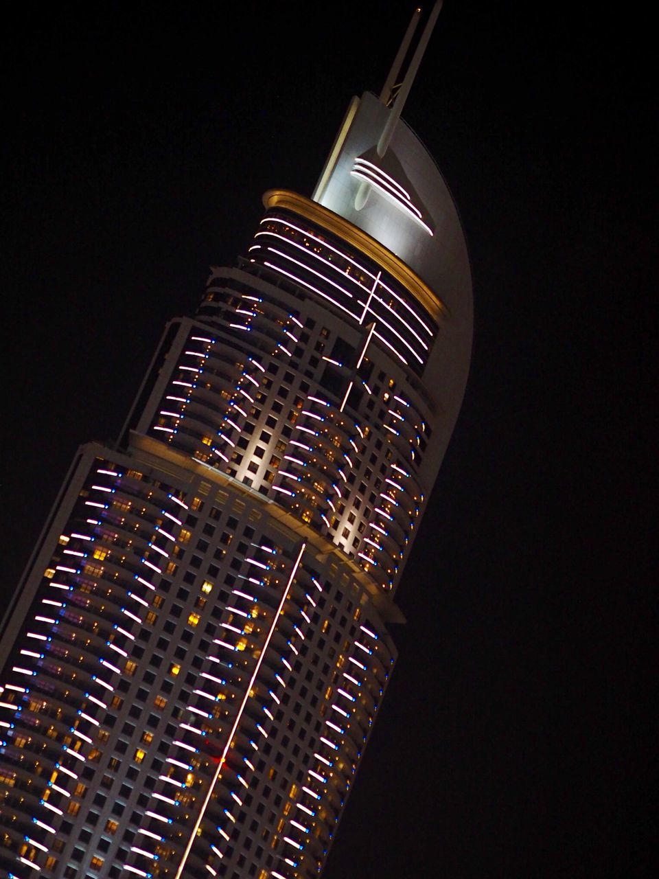 architecture, built structure, building exterior, low angle view, night, tower, tall - high, illuminated, skyscraper, modern, city, clear sky, office building, tall, building, capital cities, no people, travel destinations, copy space, famous place