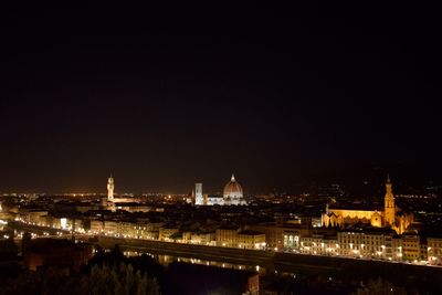 Illuminated cityscape at night
