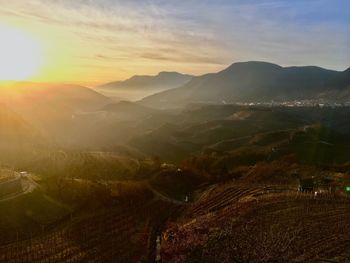 Aerial view of landscape against sky during sunset