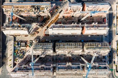 Aerial view of an enormous construction site along tagus riverside in lisbon city center, portugal.