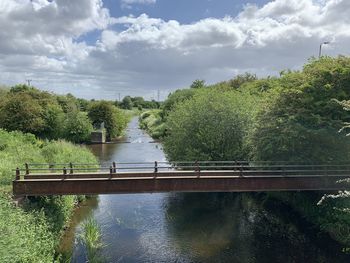 Bridge over river against sky