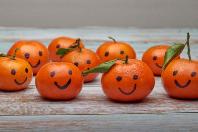 Close-up of orange fruits on table