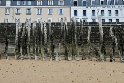 Panoramic view of beach against buildings in city