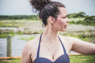 Portrait of young woman looking away