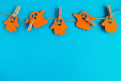 Close-up of toys against blue background