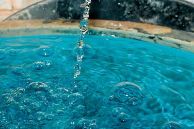 Close-up of water splashing in swimming pool