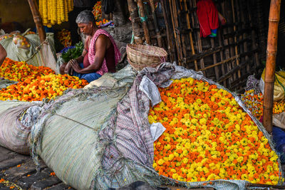 View of flowers for sale at market stall