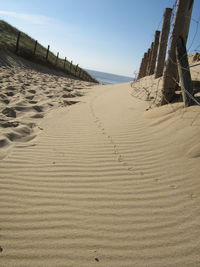 Scenic view of beach against clear sky