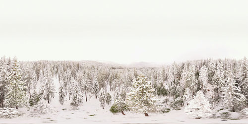 Scenic view of snow covered land against clear sky