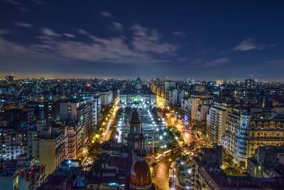 High angle view of illuminated cityscape at dusk