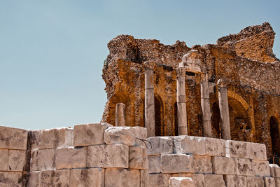 Low angle view of old ruin against the sky